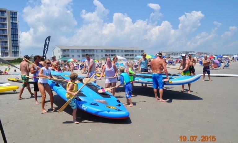 Group of people with SOL Fiesta SUP